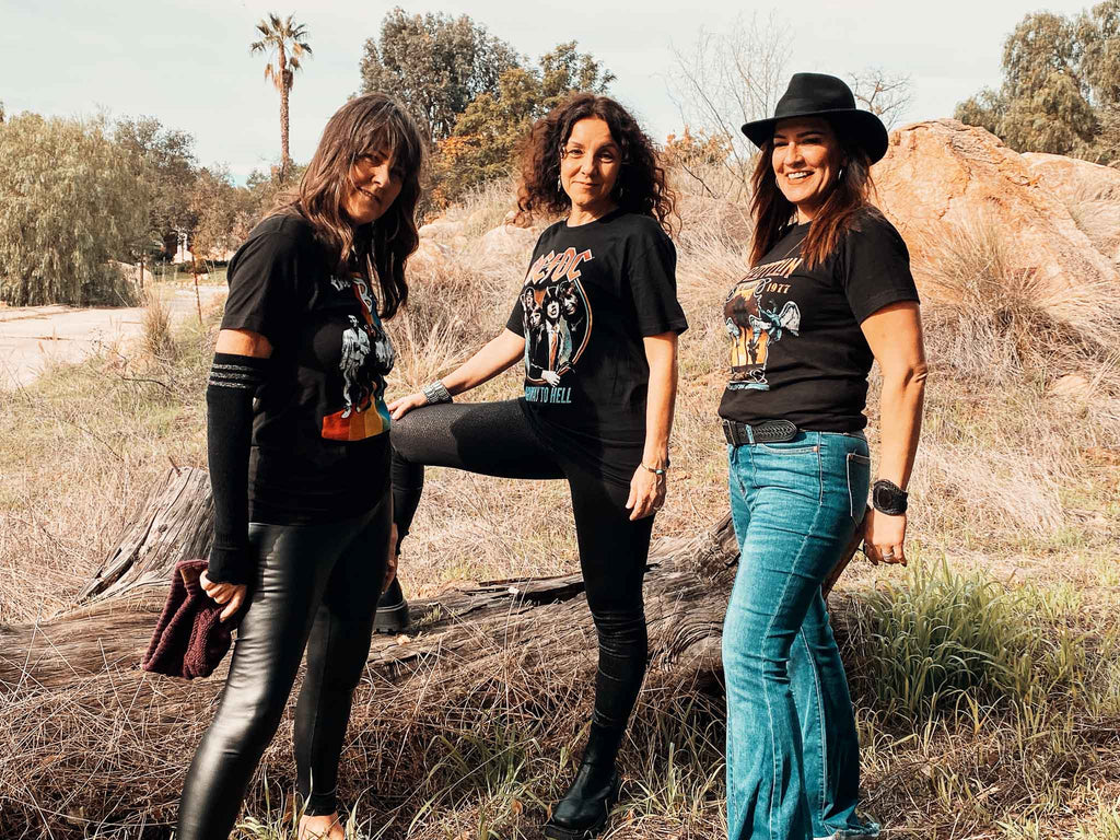 Three women modeling band tees | Rock & Roll Jane | Officially licensed band t-shirts