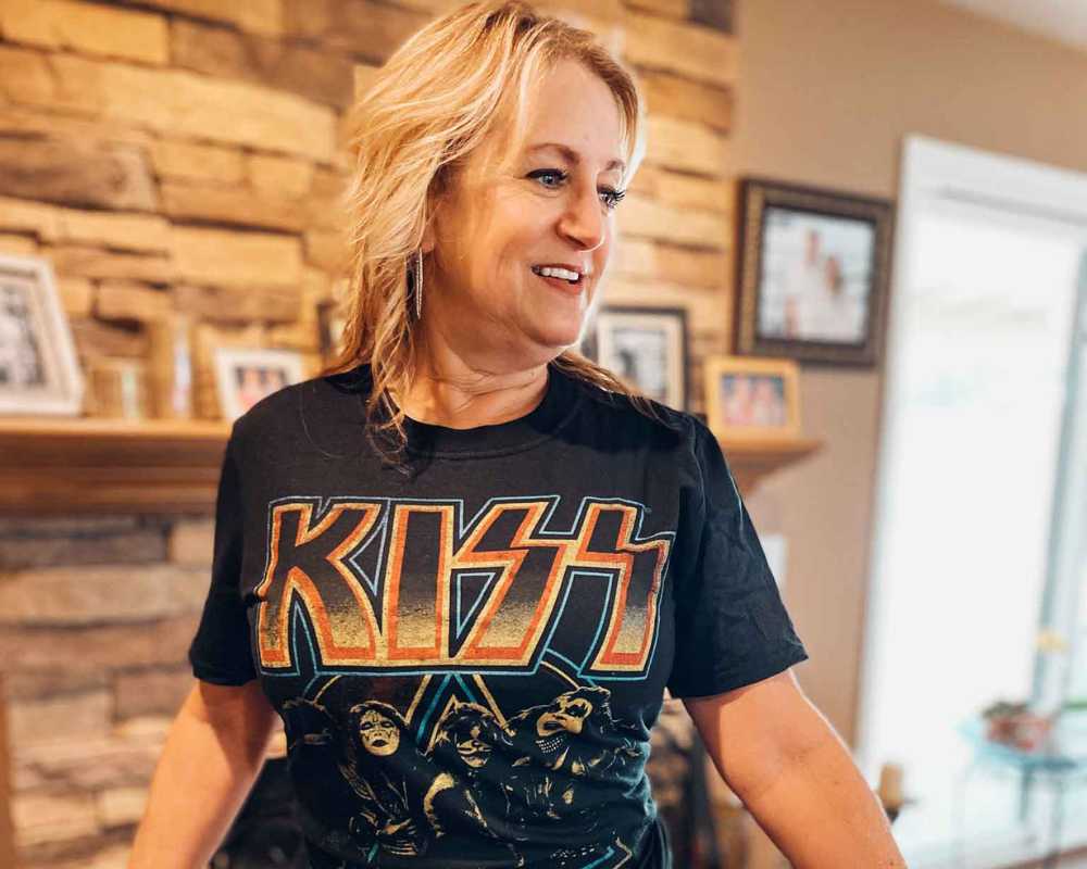 Woman wearing officially licensed KISS t-shirt from Rock & Roll Jane