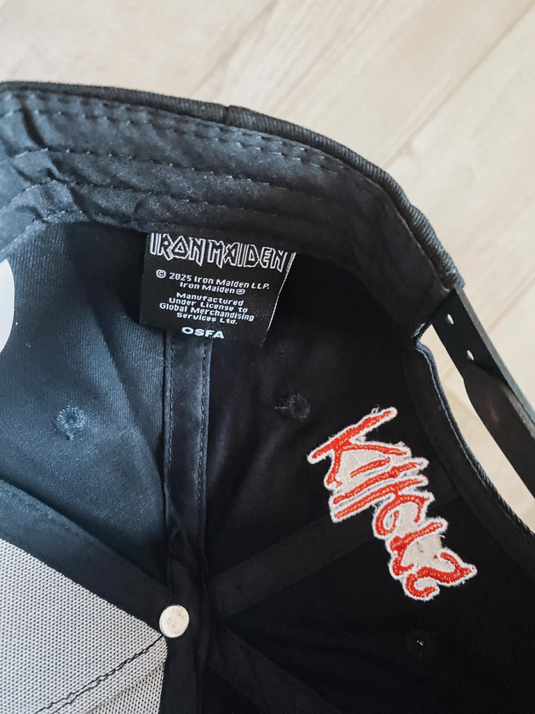 Officially licensed Iron Maiden tag on the inside.