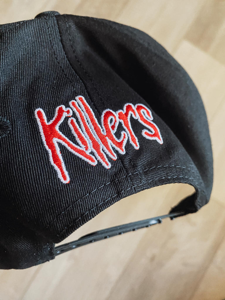 The word "killers" embroidered on the back of the hat in red with a white outline.