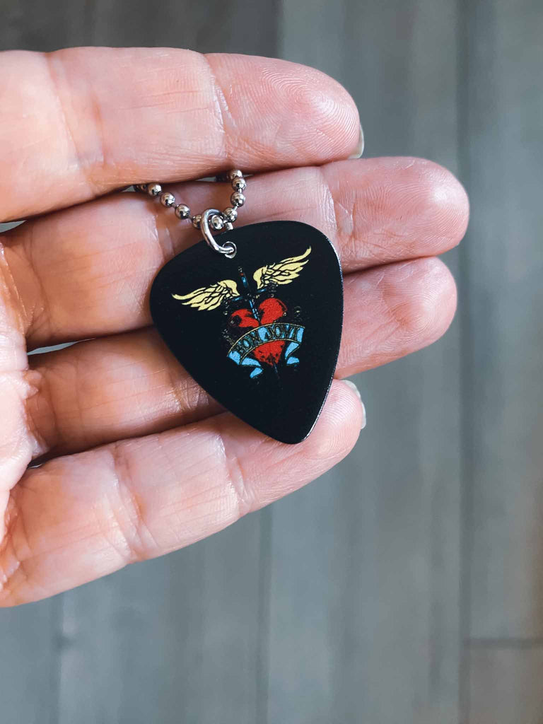 Bon Jovi Guitar Pick necklace | 18" stainless steel ball chain | fast shipping and free stickers with every order | We sell officially licensed band tees and more at Rock & Roll Jane