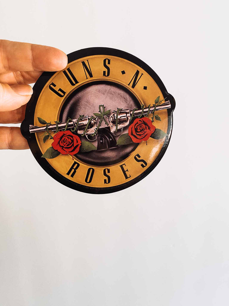 Officially licensed Guns N' Roses round bullet logo sticker available at Rock & Roll Jane.