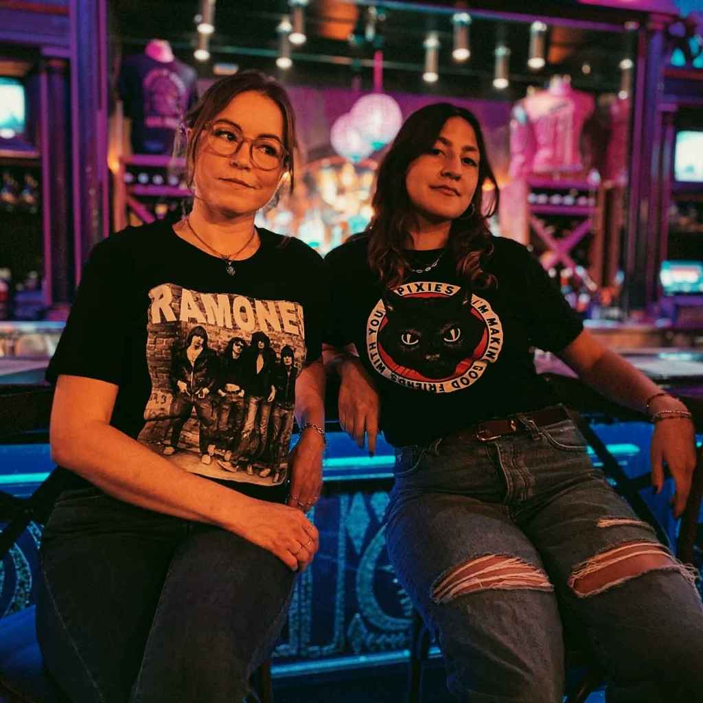 Two women modeling band tees from the Ramones and the Pixies | Rock & Roll Jane | Officially licensed band tees and accessories