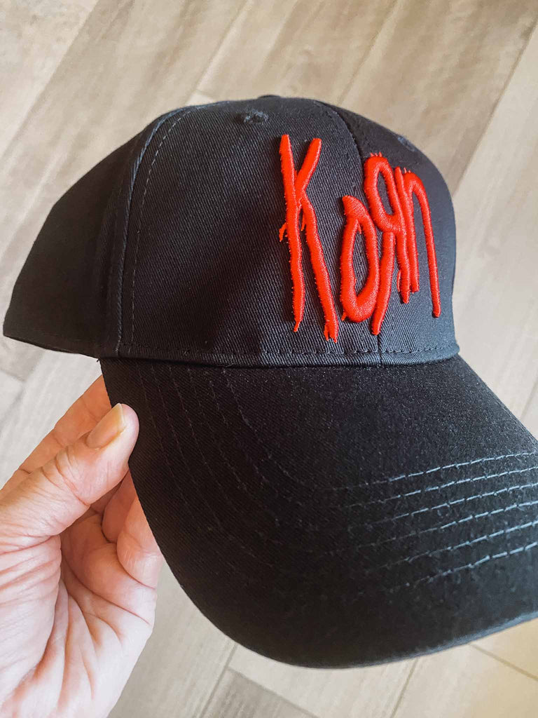 Officially licensed Korn baseball cap | 100% cotton with red embroidered Korn logo on front | adjustable velcro strip | Available at Rock & Roll Jane