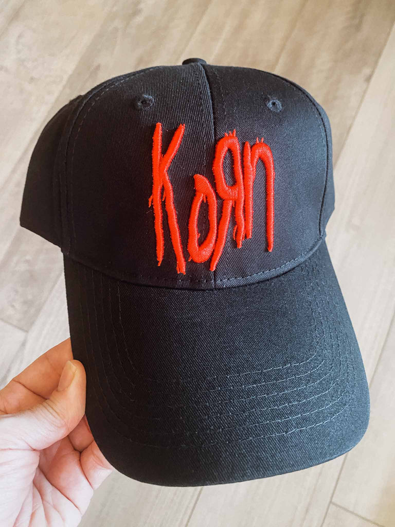 Officially licensed Korn baseball cap | 100% cotton with red embroidered Korn logo on front | adjustable velcro strip | Available at Rock & Roll Jane