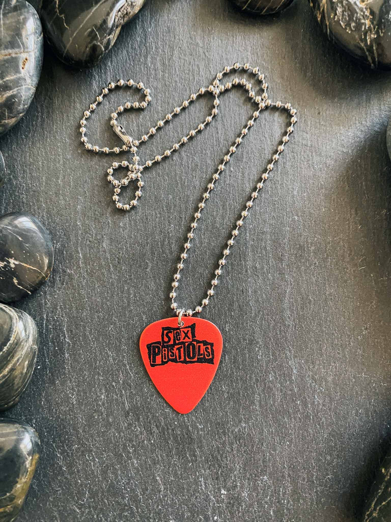 Sex Pistols guitar pick necklace | 18" ball chain with extra cord | Officially licensed band tees and rock-n-roll accessories | Rock & Roll Jane