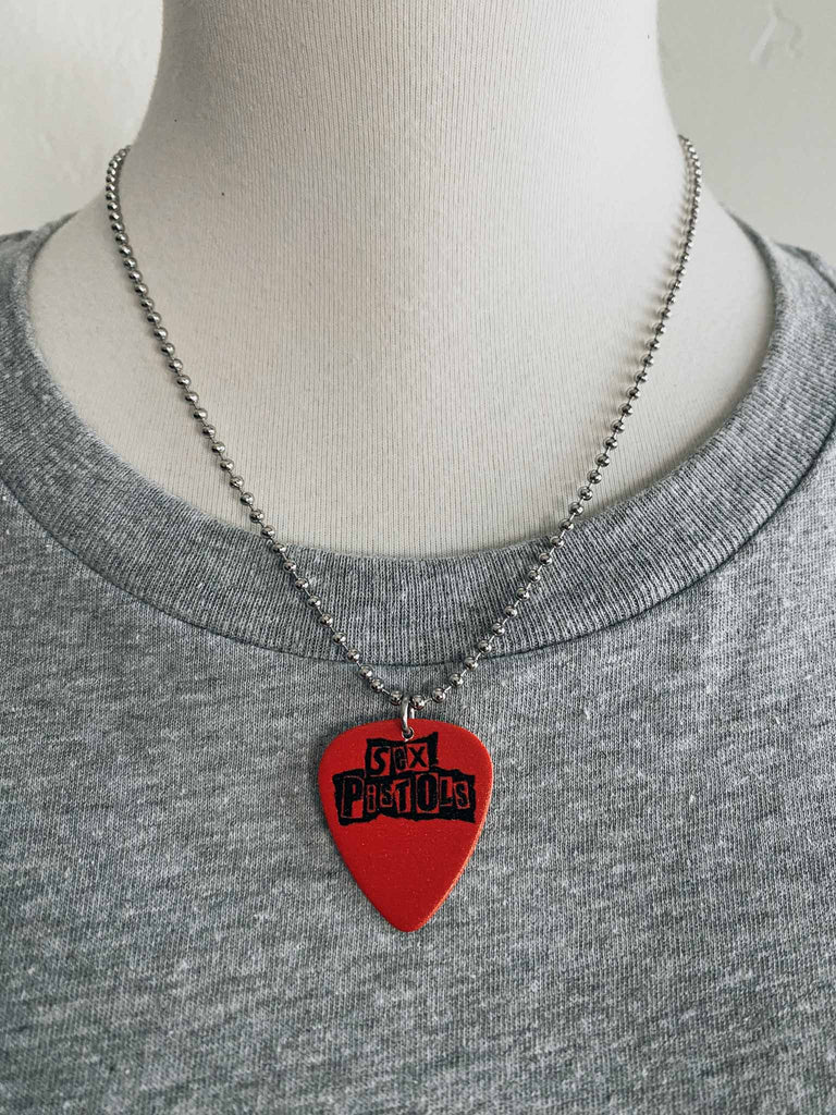 Sex Pistols guitar pick necklace | 18" ball chain with extra cord | Officially licensed band tees and rock-n-roll accessories | Rock & Roll Jane