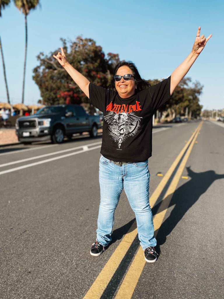 woman modeling Motley Crue Dr. Feelgood Black T-shirt | Officially licensed band tee | Rock & Roll Jane