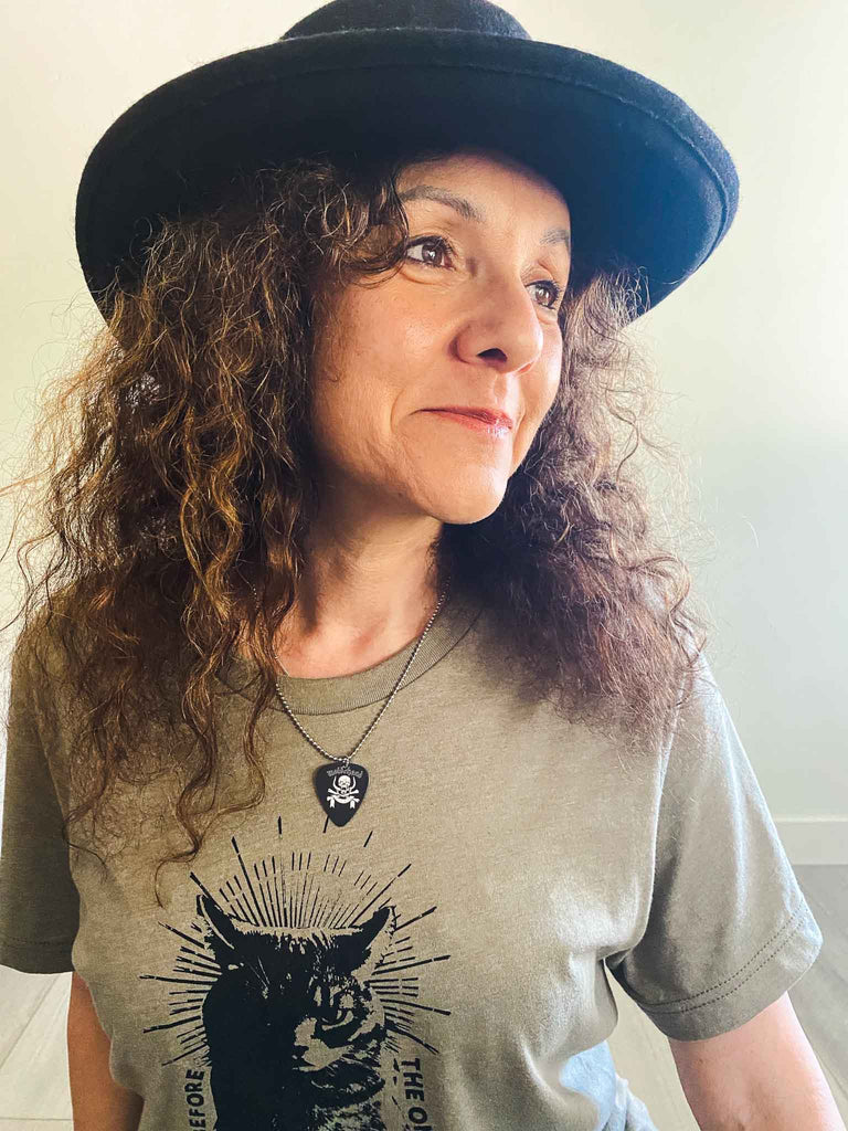 Woman wearing guitar pick necklace | Motorhead merchandise | band merch | Rock & Roll Jane
